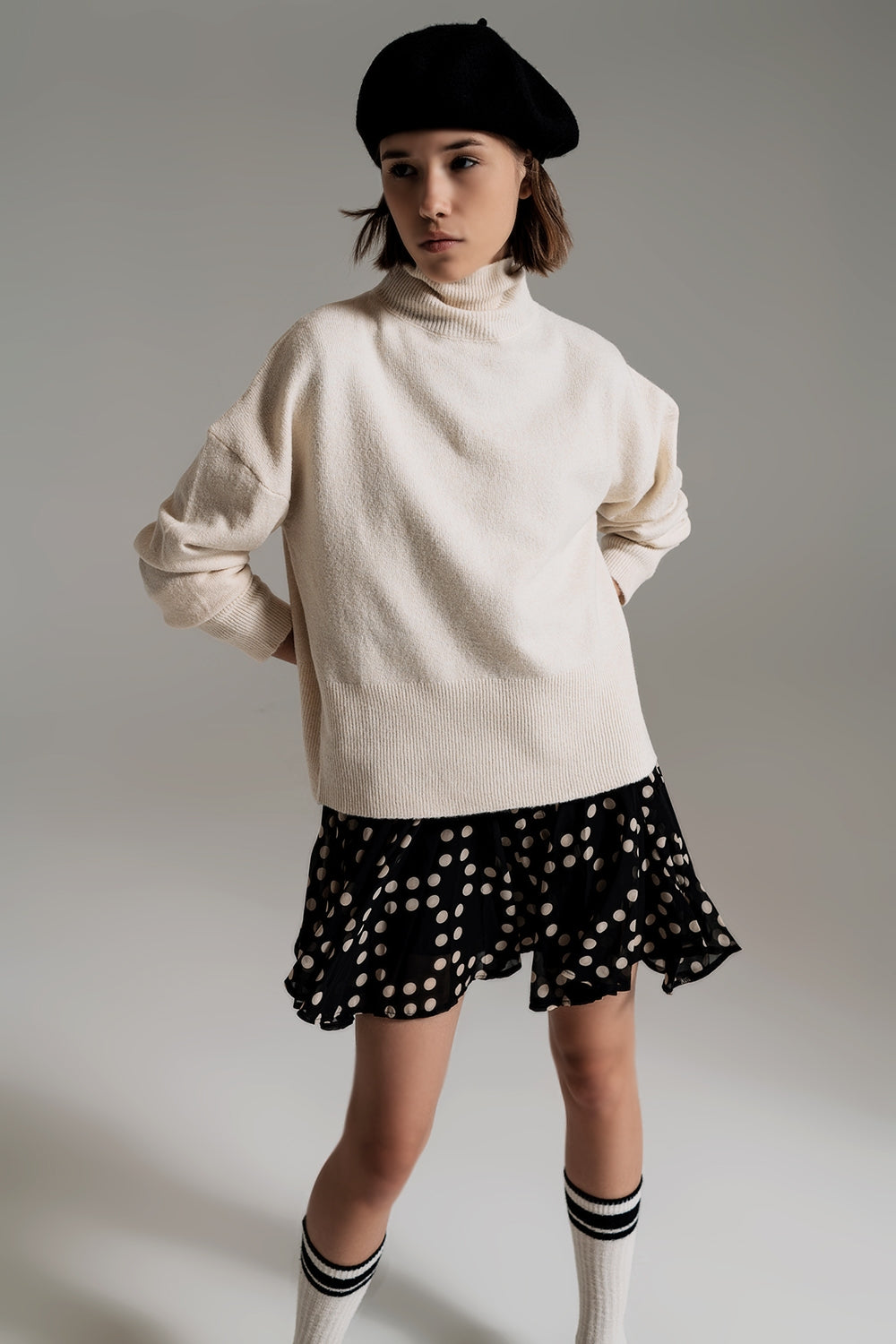 Beige Turtleneck Sweater in a Soft Knitted Fabric